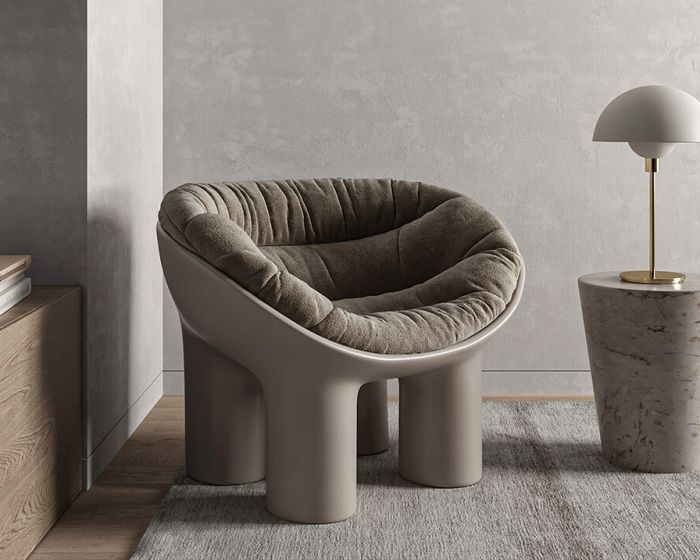 The modular sofa in two versions includes a corner block and two ottomans (Demo)