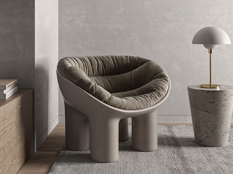 The modular sofa in two versions includes a corner block and two ottomans (Demo)